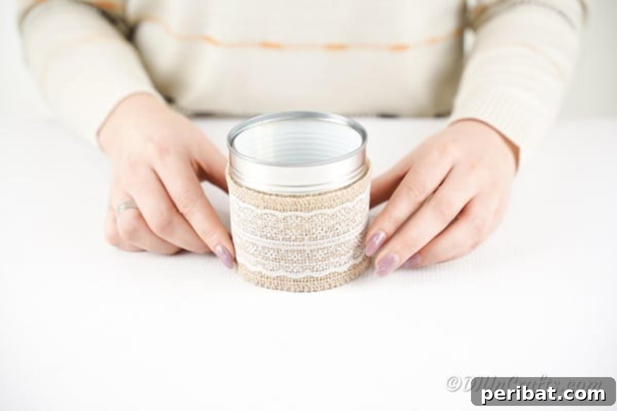 Chic Burlap Lace Accent Canister 10 Gluing burlap and lace fabric around a tin can