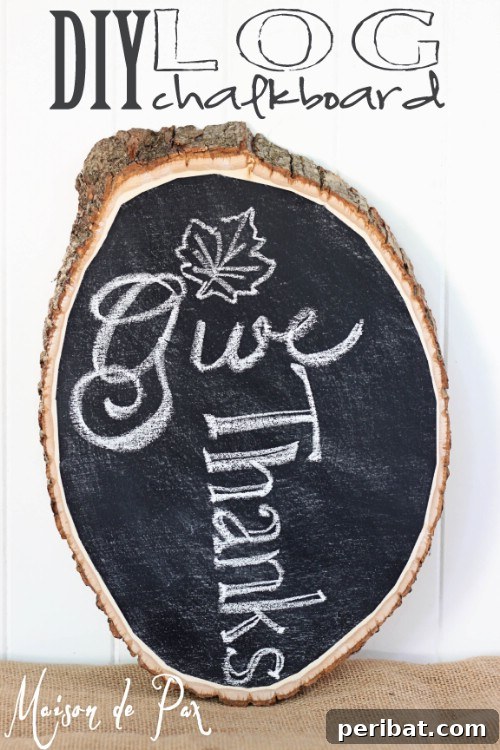 Chalkboard on a log.