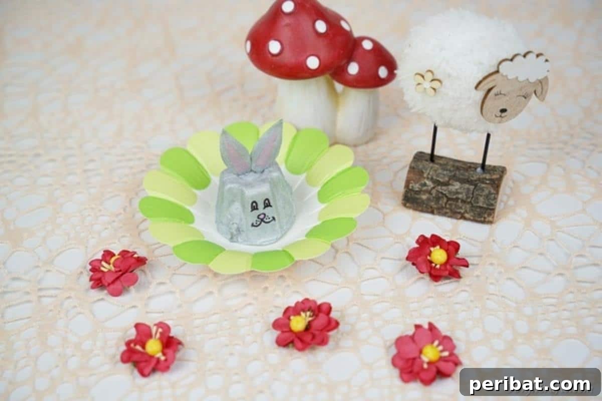 Adorable Upcycled Egg Carton Easter Bunny Craft 6 A collection of handmade egg carton Easter bunnies, displayed alongside other festive Easter decor like speckled eggs and spring flowers, highlighting their role in a charming holiday setup.
