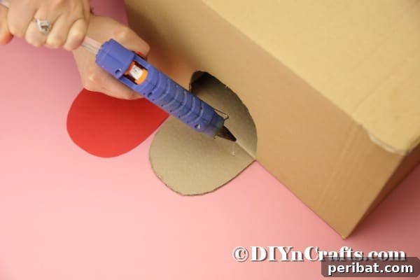 Hoppy Easter Box Ball Toss 28 Gluing tongue onto box