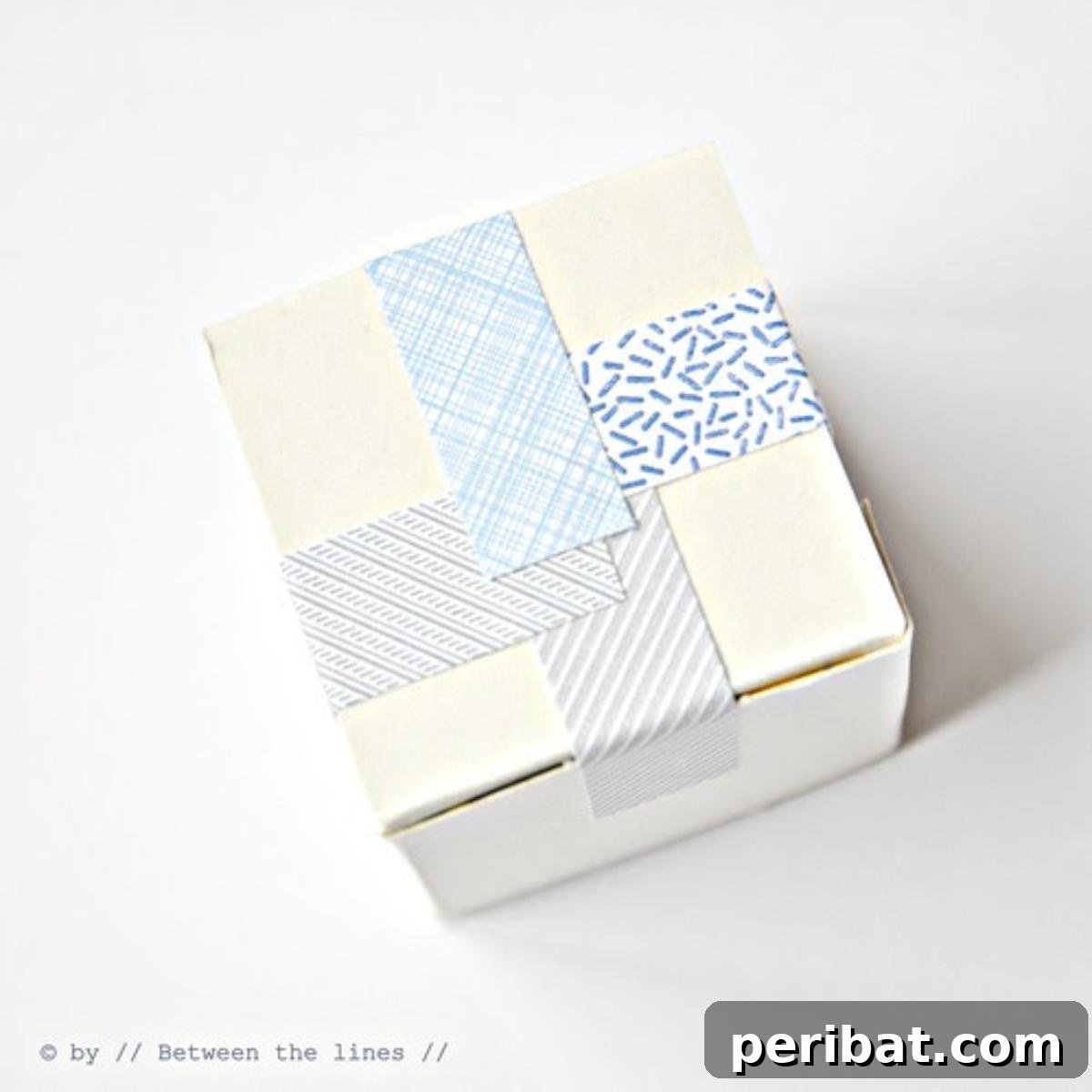 A gift box decorated with elegant strips cut from the patterned interiors of security envelopes, creating a unique and sophisticated design similar to washi tape.