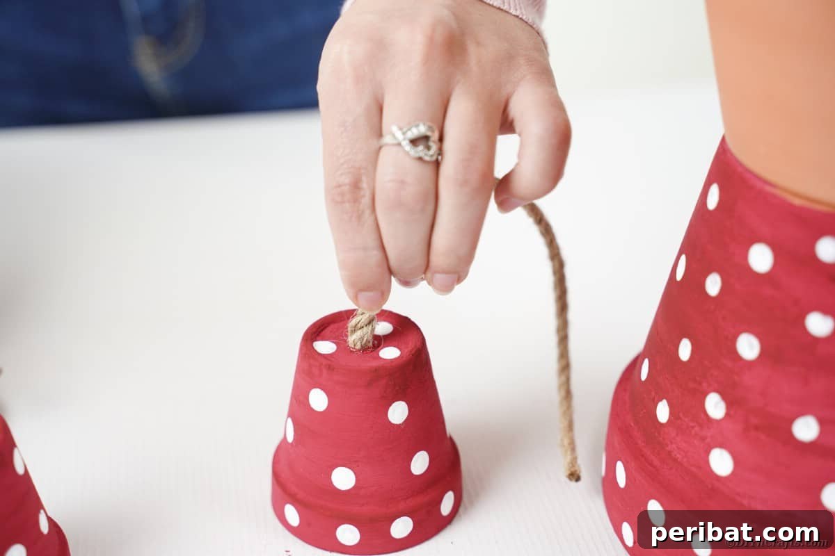 Adding rope to flower pot arms