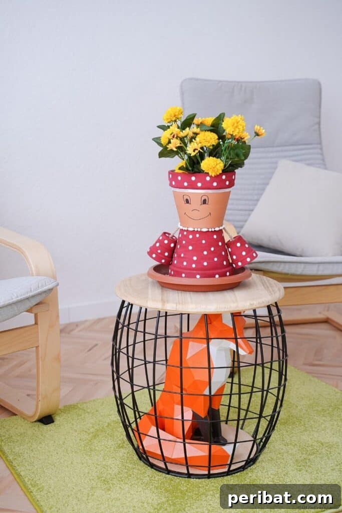 Charming flower pot person on a rustic wooden stool