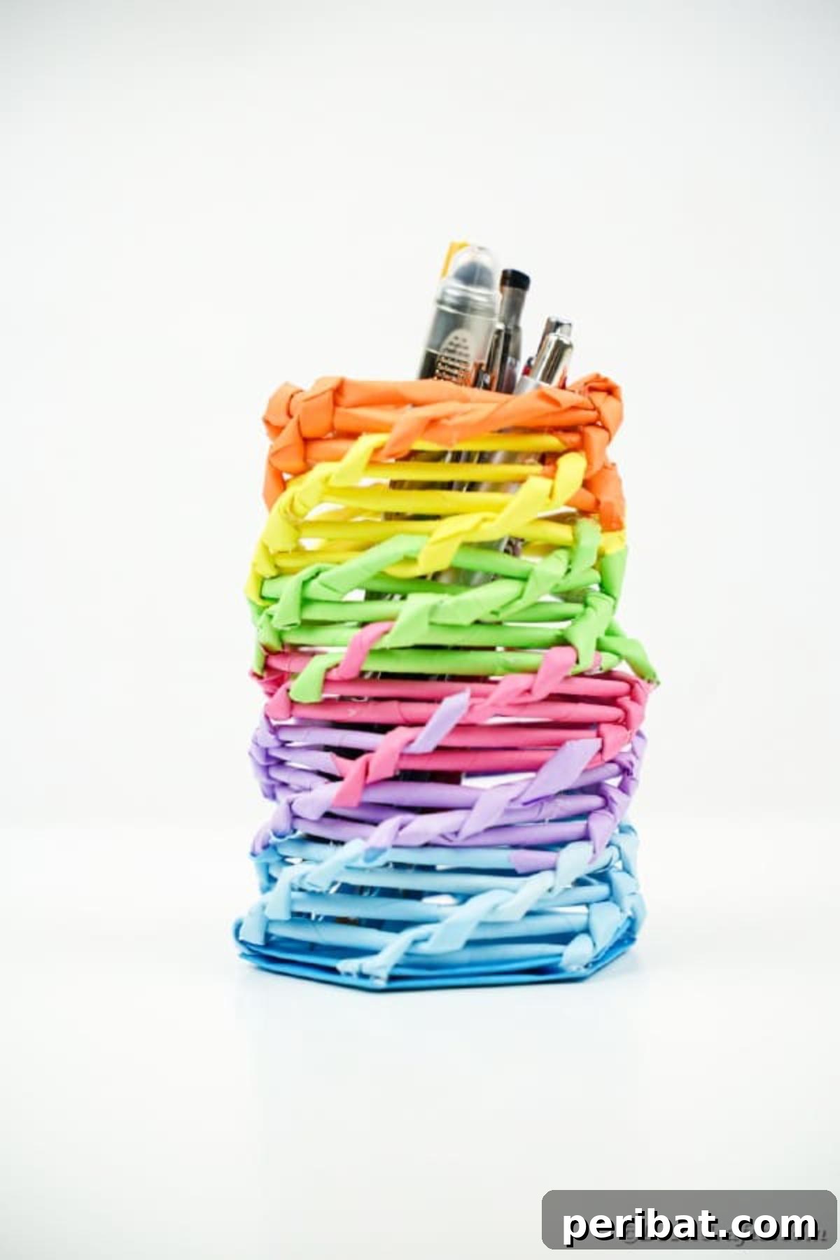 Vibrant DIY Paper Straw Desk Caddy 30 The vibrant rainbow organizer can standing proudly on a clean white surface, showcasing its completed design.