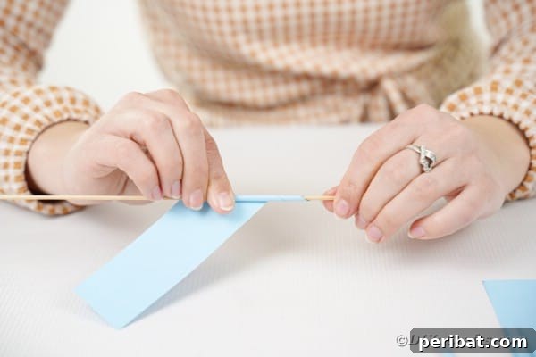 Vibrant DIY Paper Straw Desk Caddy 33 Rolling paper into a straw