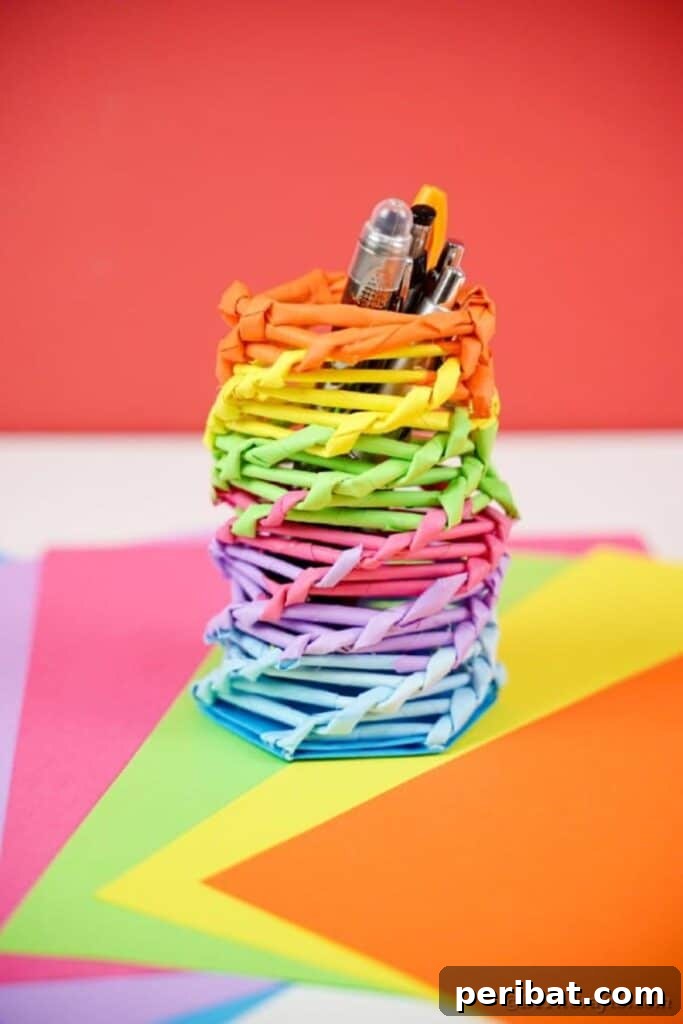 Vibrant DIY Paper Straw Desk Caddy 43 Top-down view of rainbow organizer on rainbow paper