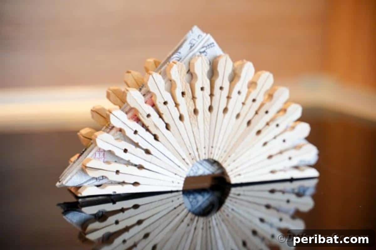 Chic Repurposed Clothespin Napkin Rack 6 The rustic clothespin napkin holder is displayed on a dark table, highlighting its natural textures and aesthetic.