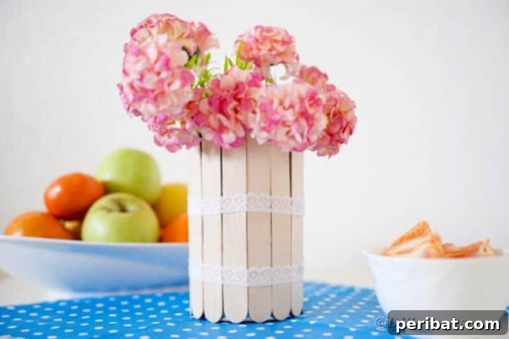Transform Tin Cans into a Rustic Craft Stick Organizer Video Tutorial 14 Craft stick can on blue and white polka dot fabric