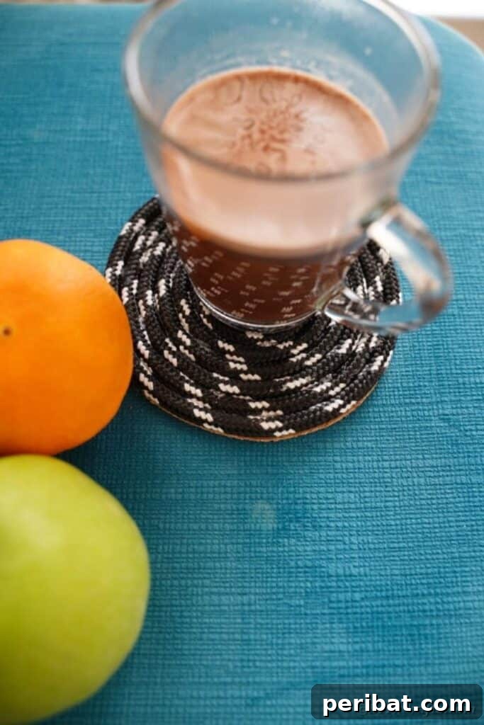 Black and white rope coaster on blue table