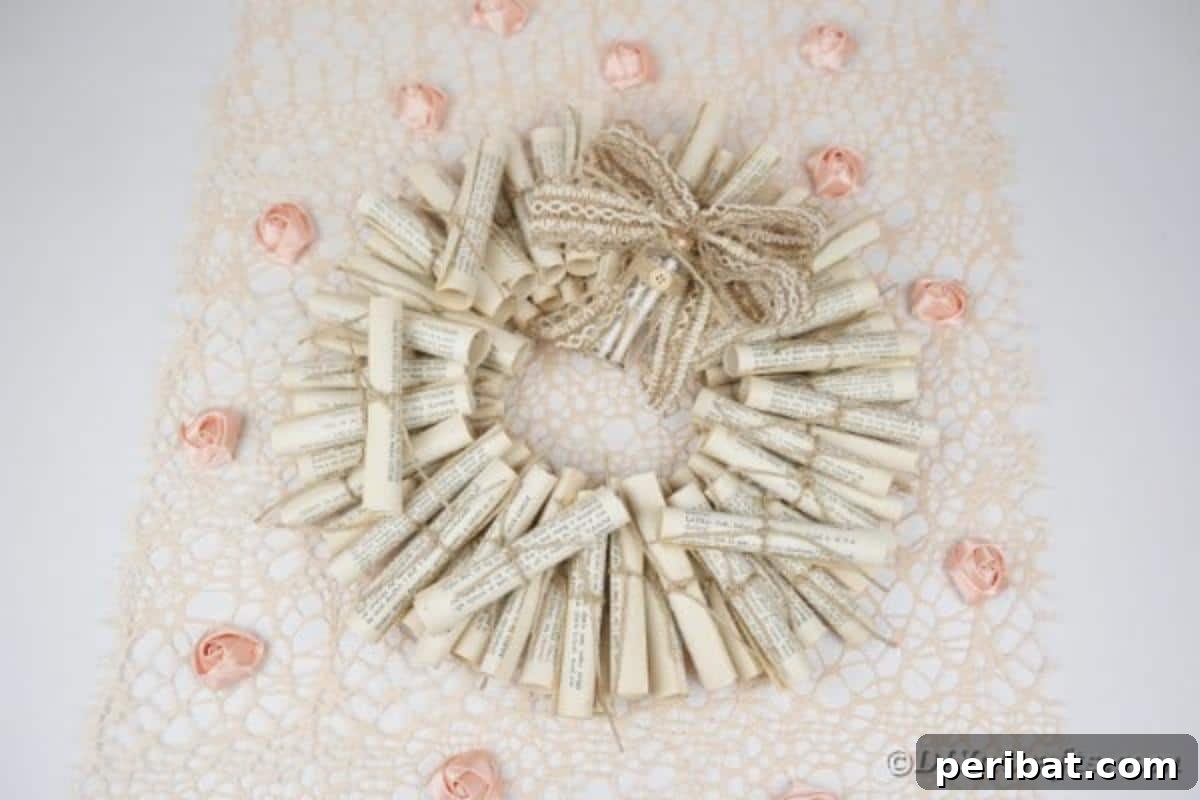 Artful Scroll Wreath from Repurposed Book Pages 3 Book page wreath surrounded by pink papers