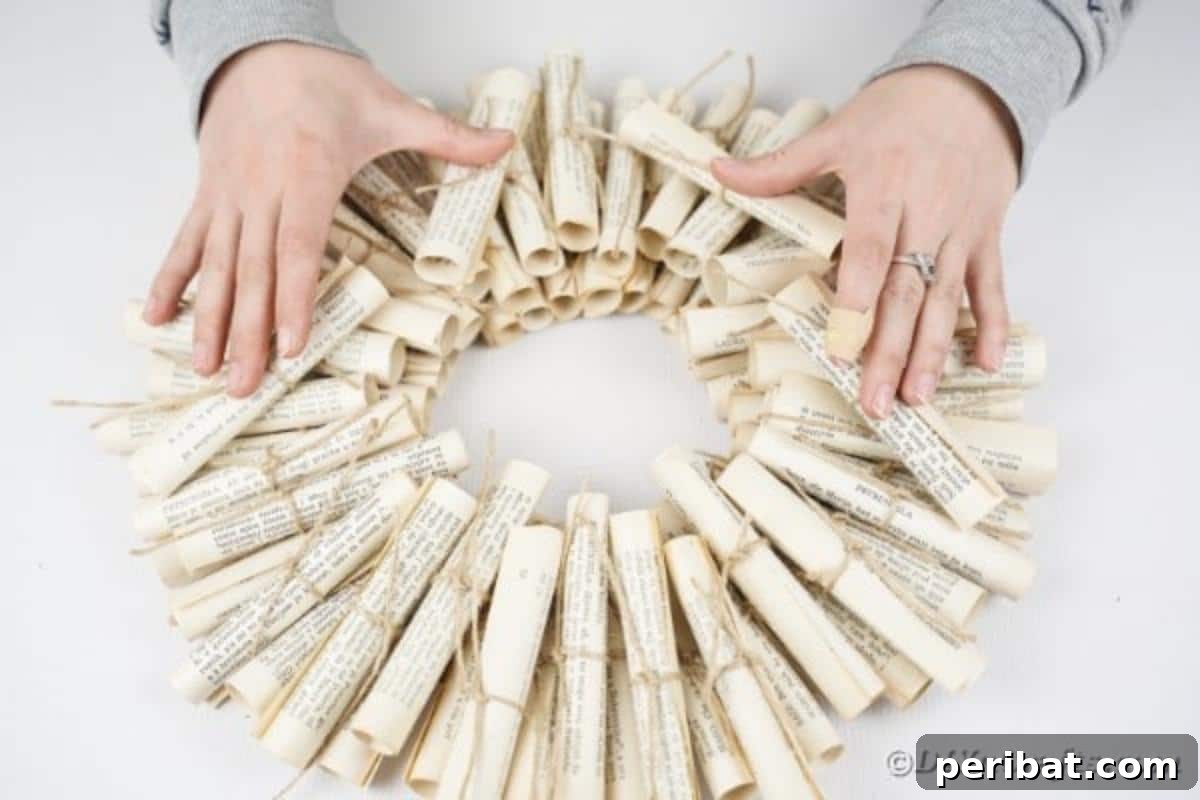 Artful Scroll Wreath from Repurposed Book Pages 21 Hands on scroll wreath