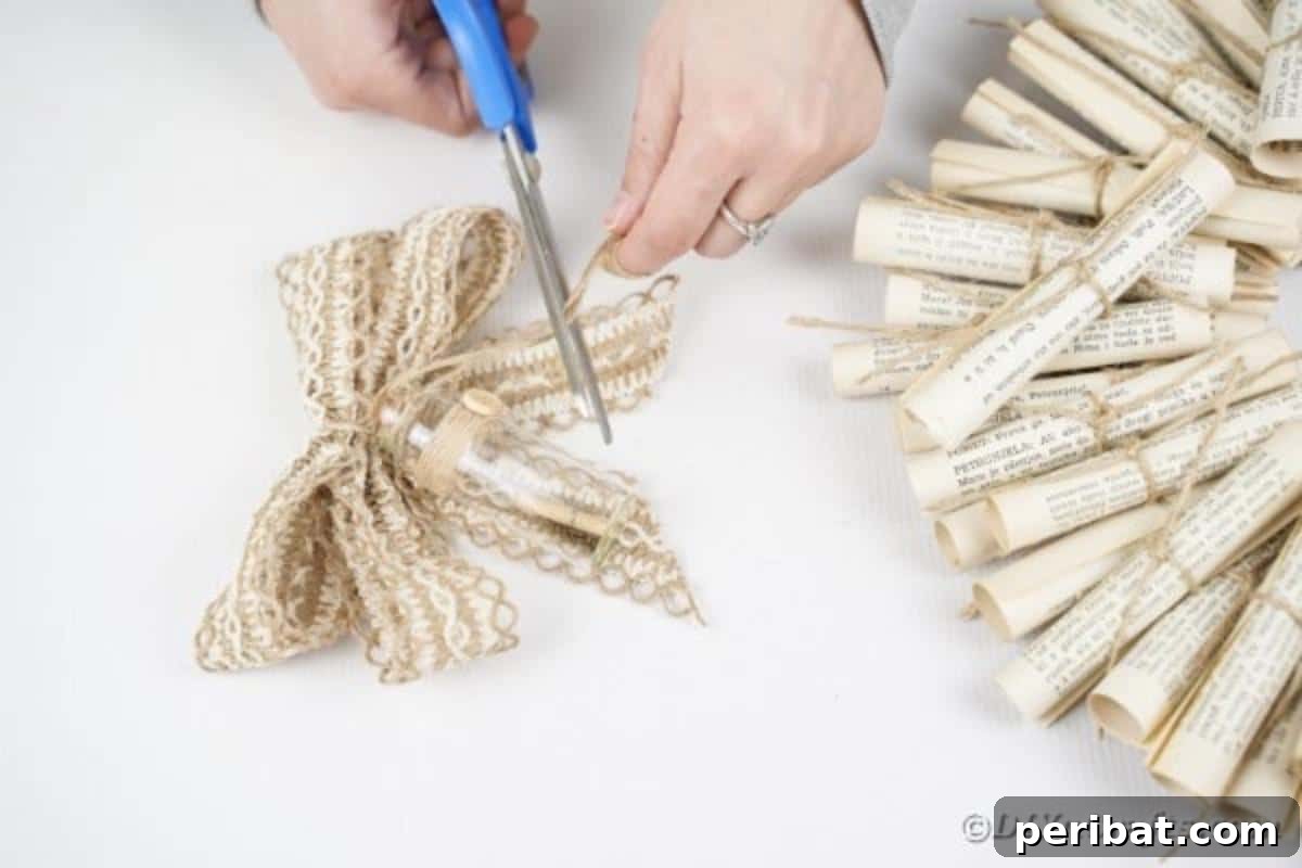 Artful Scroll Wreath from Repurposed Book Pages 23 Cutting ribbon for a bow