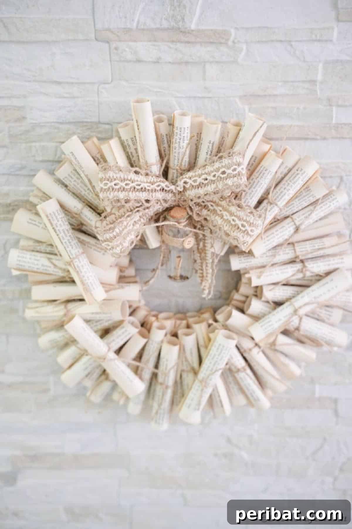 Artful Scroll Wreath from Repurposed Book Pages 25 Scroll wreath on brick wall