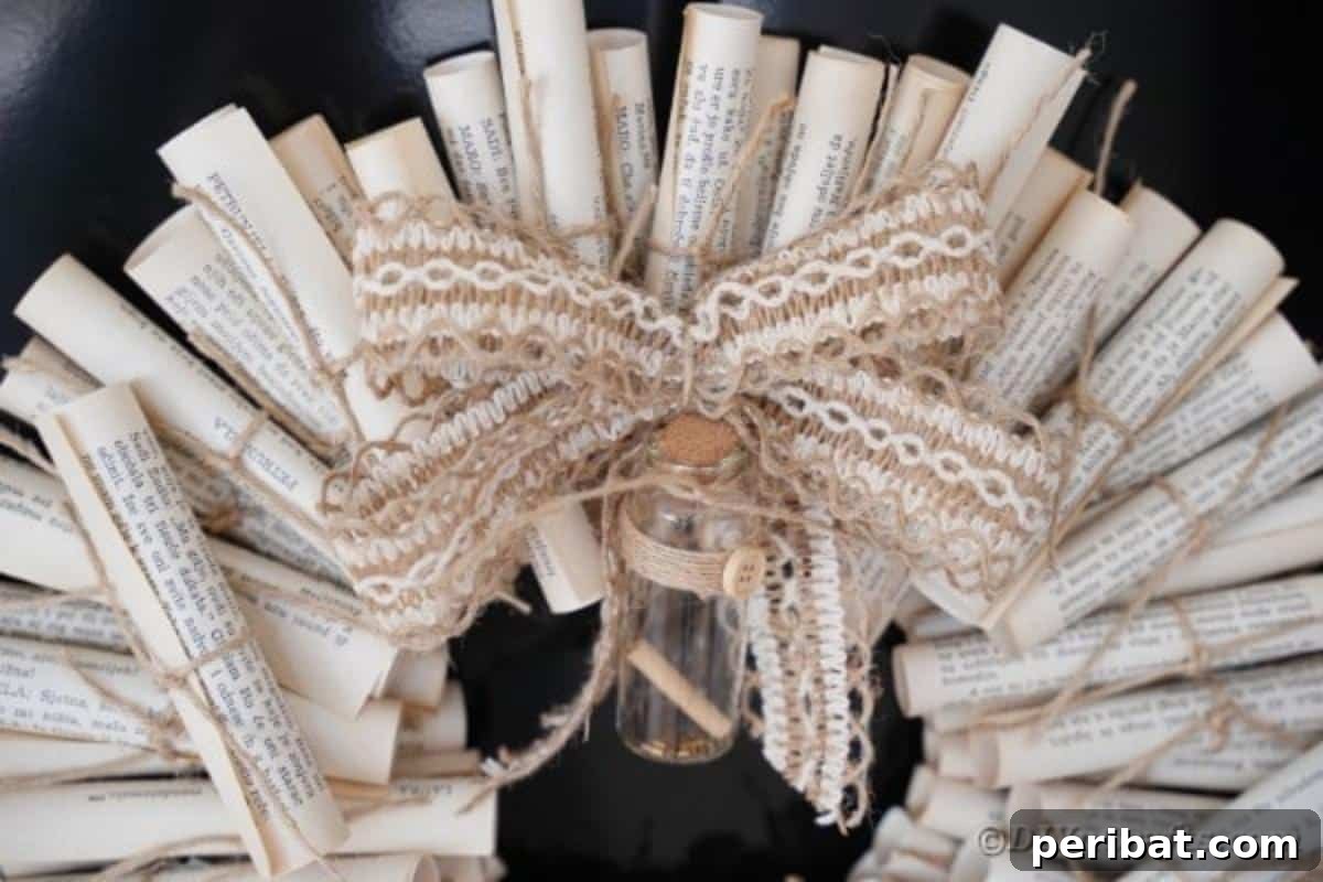 Artful Scroll Wreath from Repurposed Book Pages 6 Scroll wreath hanging on window