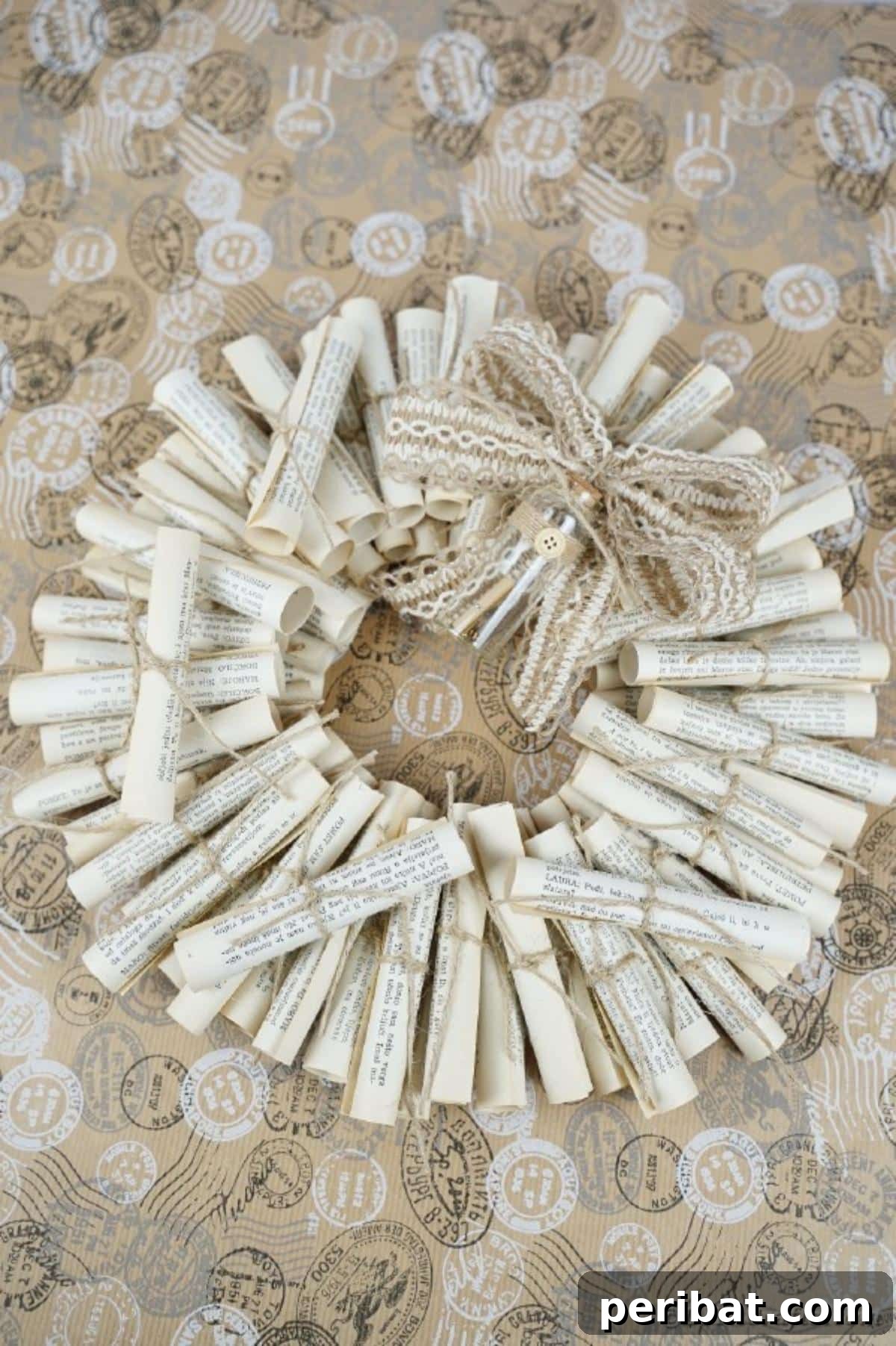 Artful Scroll Wreath from Repurposed Book Pages 7 Scroll wreath on beige background