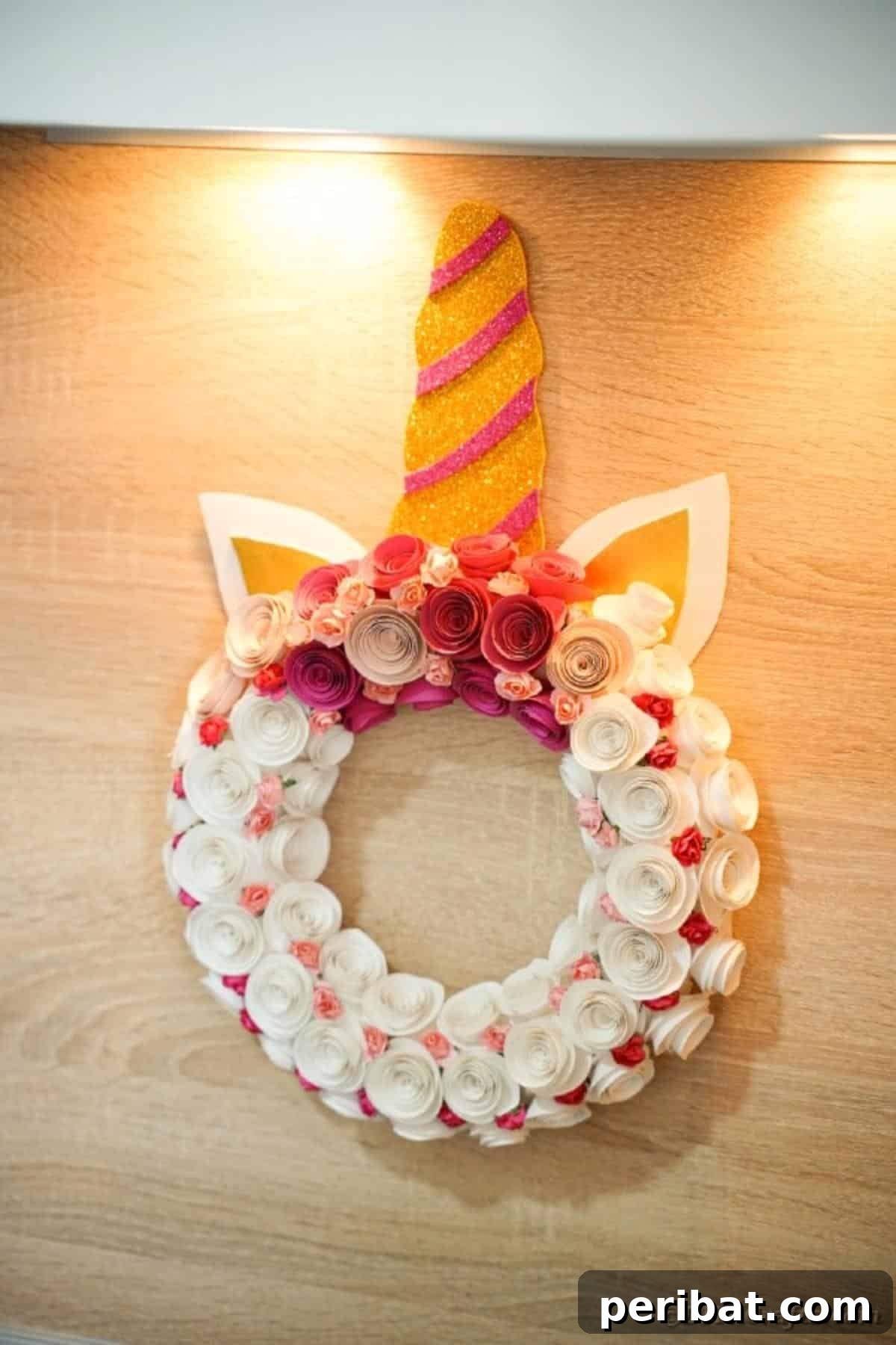Enchanting Quilled Unicorn Wreath 21 A close-up shot of the paper unicorn wreath hanging on a kitchen wall, demonstrating how it integrates beautifully into home decor.
