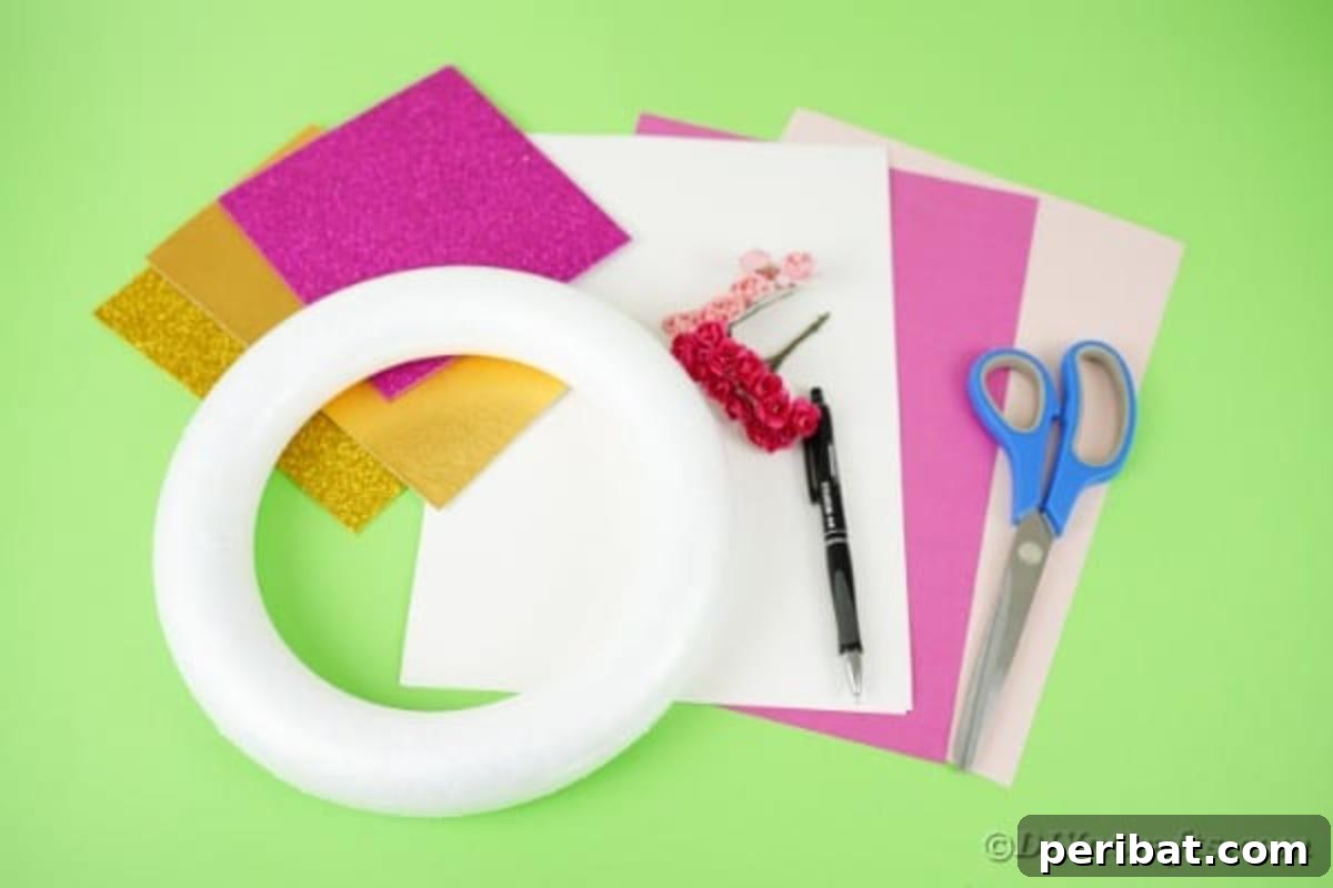 Enchanting Quilled Unicorn Wreath 6 An organized flat lay of all the supplies needed to create a unicorn wreath, including various colored papers, a wreath form, scissors, and glue, laid out on a clean surface.