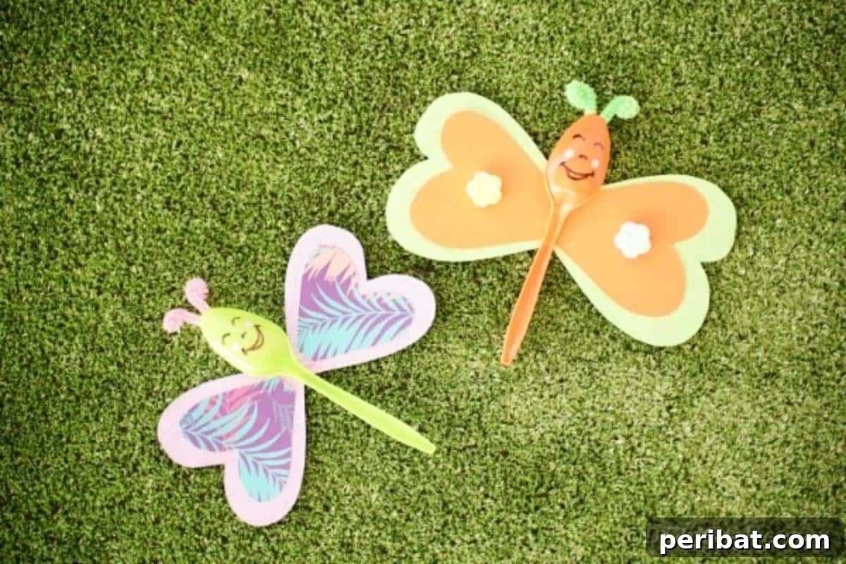 A collection of colorful upcycled spoon butterflies resting gracefully on a bed of vibrant green grass, evoking a natural, whimsical scene.