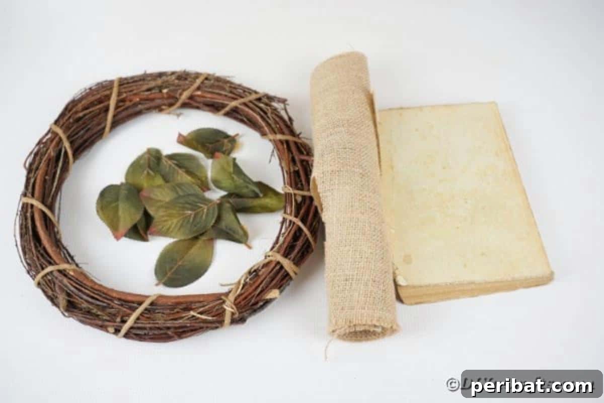 A collection of supplies neatly arranged on a table, ready for crafting the book page wreath.