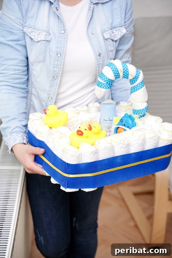 Charming Handmade Diaper Tub Shower Present 38 Woman holding a diaper baby bathtub