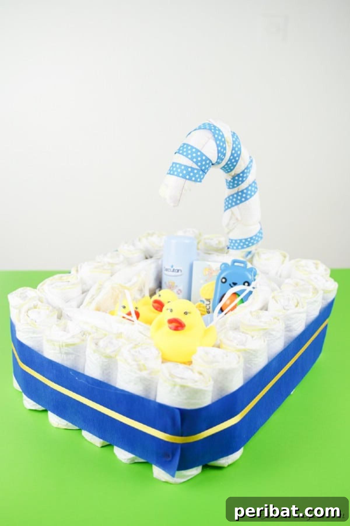 Charming Handmade Diaper Tub Shower Present 39 A charming diaper bathtub creation displayed on a vibrant green table