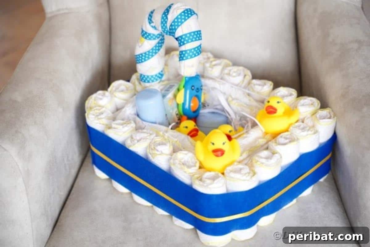 Charming Handmade Diaper Tub Shower Present 6 Beautifully decorated diaper cake on a cozy armchair