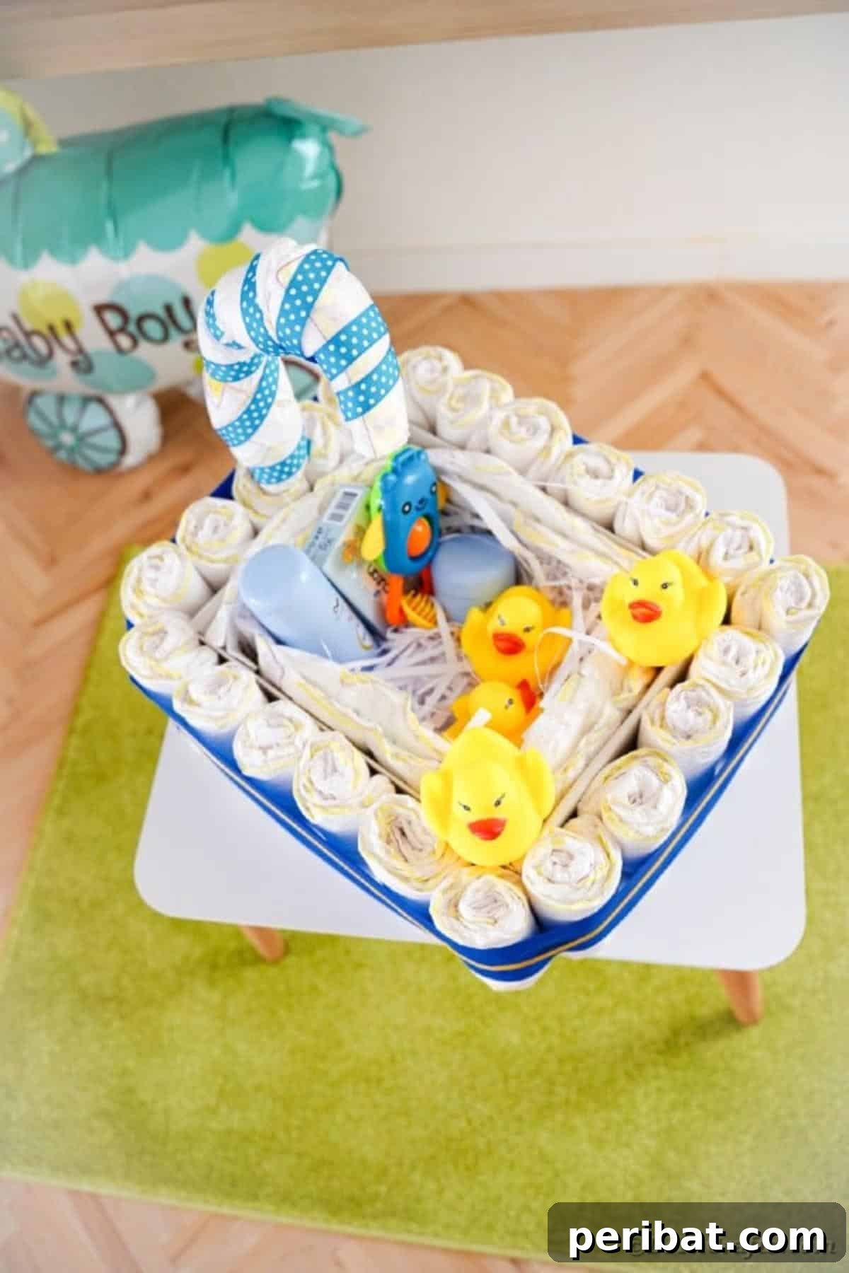 Charming Handmade Diaper Tub Shower Present 7 Artfully arranged diaper cake on a charming end table