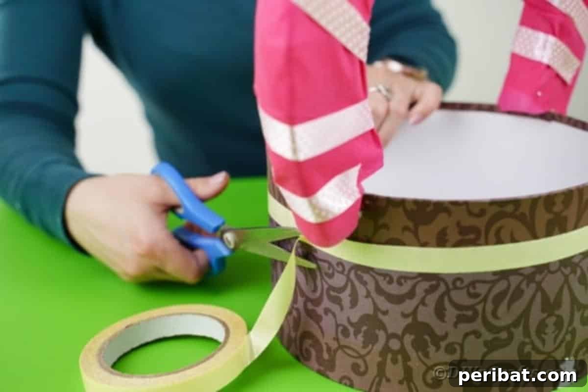 Charming Pink Handmade Diaper Basket Baby Shower Present 16 Applying two strips of removable double-sided tape around the circumference of the hat box
