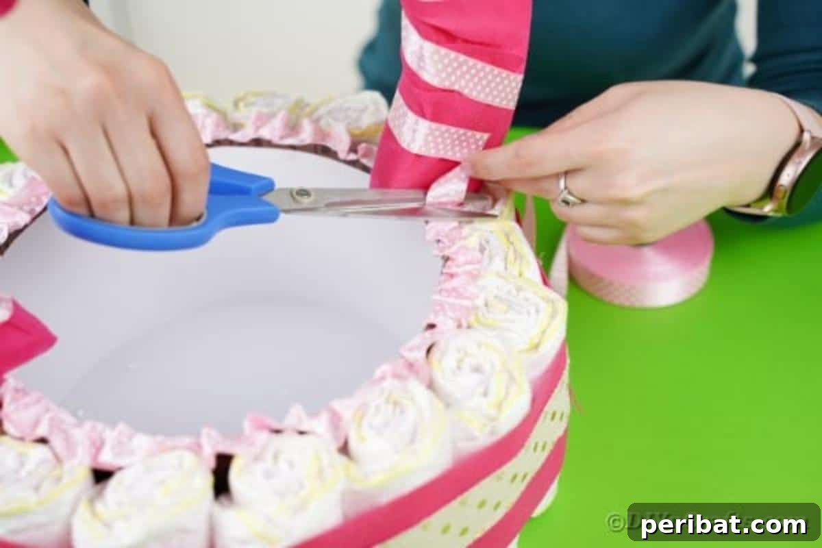 Charming Pink Handmade Diaper Basket Baby Shower Present 22 Finishing the ruffle ribbon by carefully cutting off the excess from the basket top