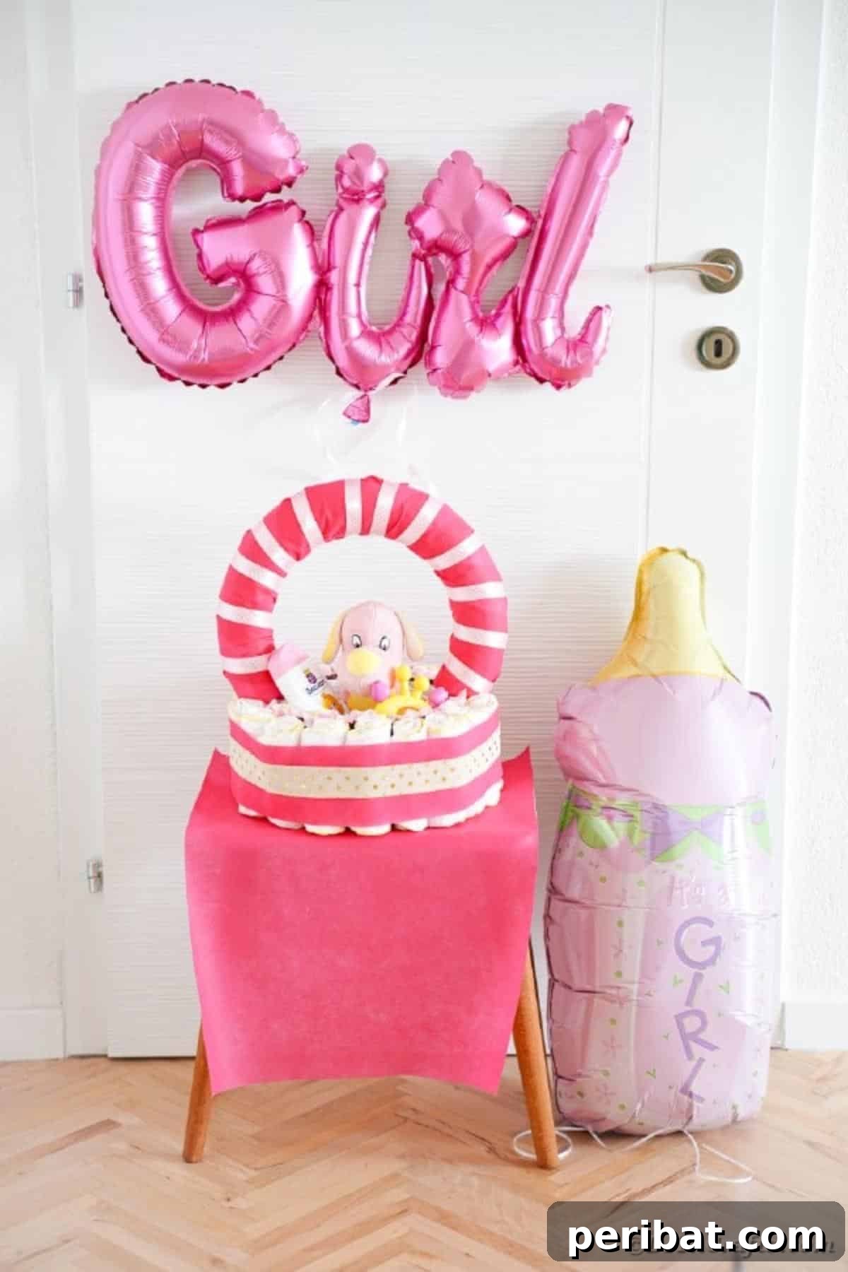 Charming Pink Handmade Diaper Basket Baby Shower Present 29 Detailed view of the diaper basket on a table covered in soft pink fabric, highlighting its delicate decorations