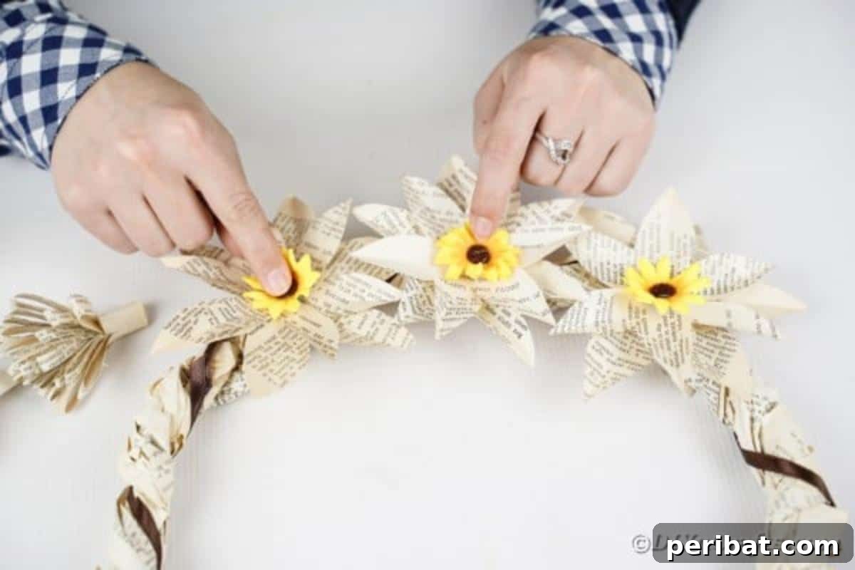 Attaching sunflowers to wreath