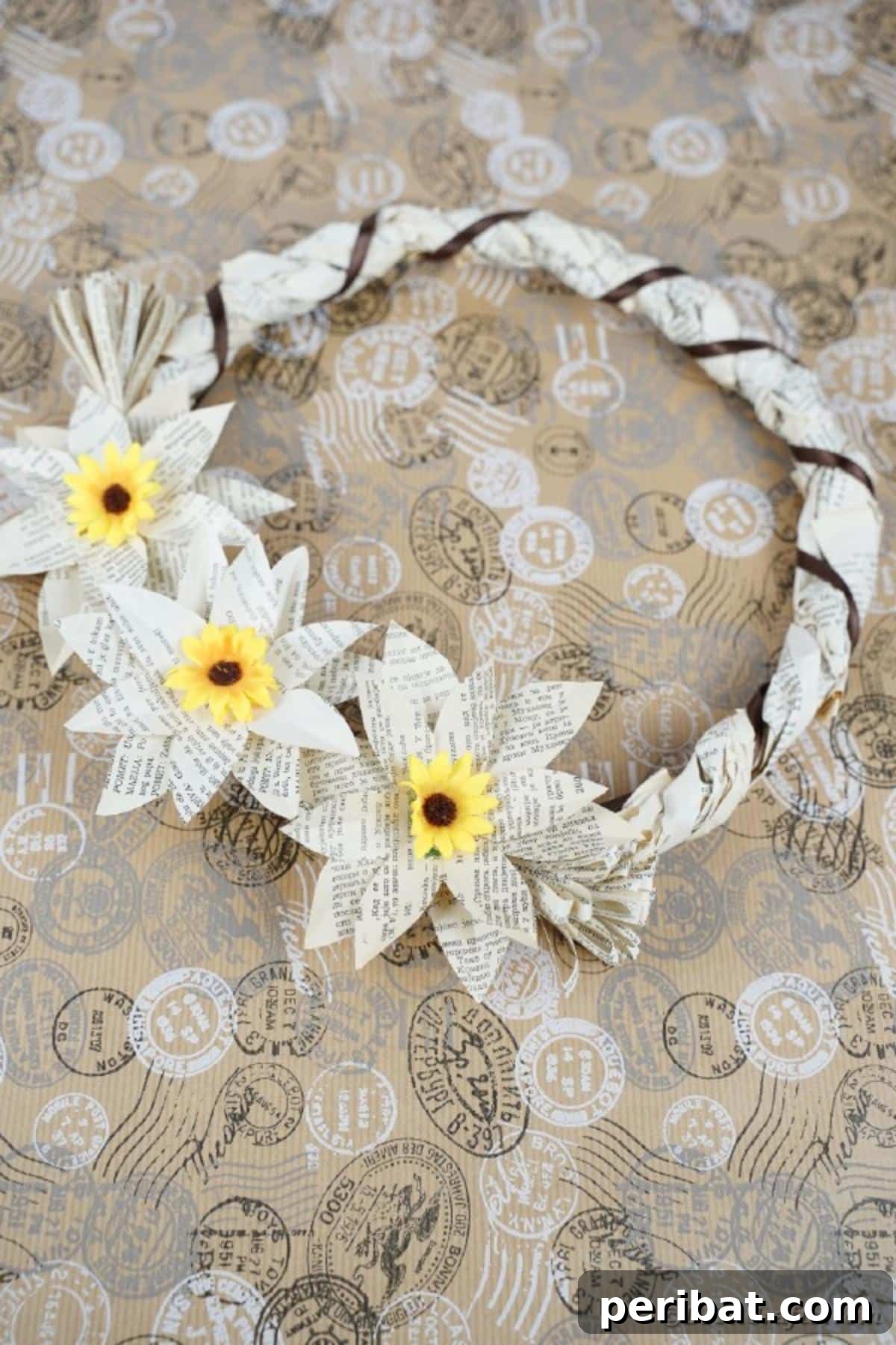 Old Book Page Wrapped Wreath on floral background