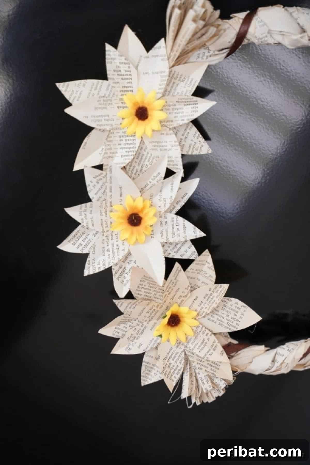 Book page flowers on wreath
