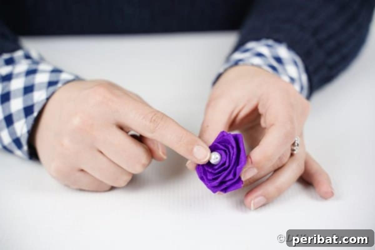 Crafting Elegant Tissue Paper Roses Step by Step 15 Gluing a pearl onto a tissue paper rose