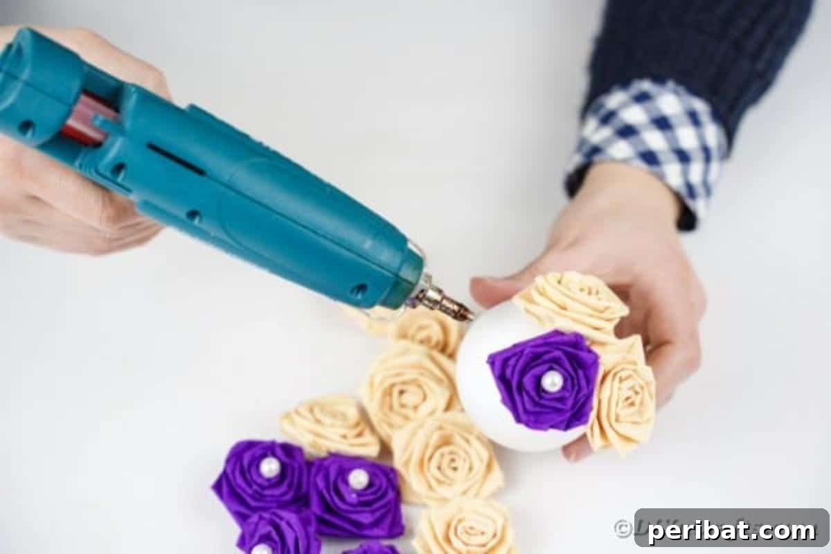 Crafting Elegant Tissue Paper Roses Step by Step 17 Gluing a paper rose to a Styrofoam ball