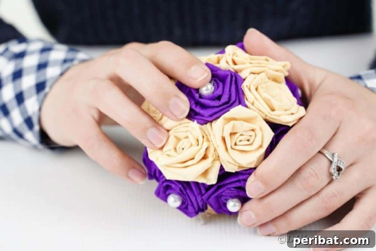 Crafting Elegant Tissue Paper Roses Step by Step 18 Gluing a paper rose to a Styrofoam ball