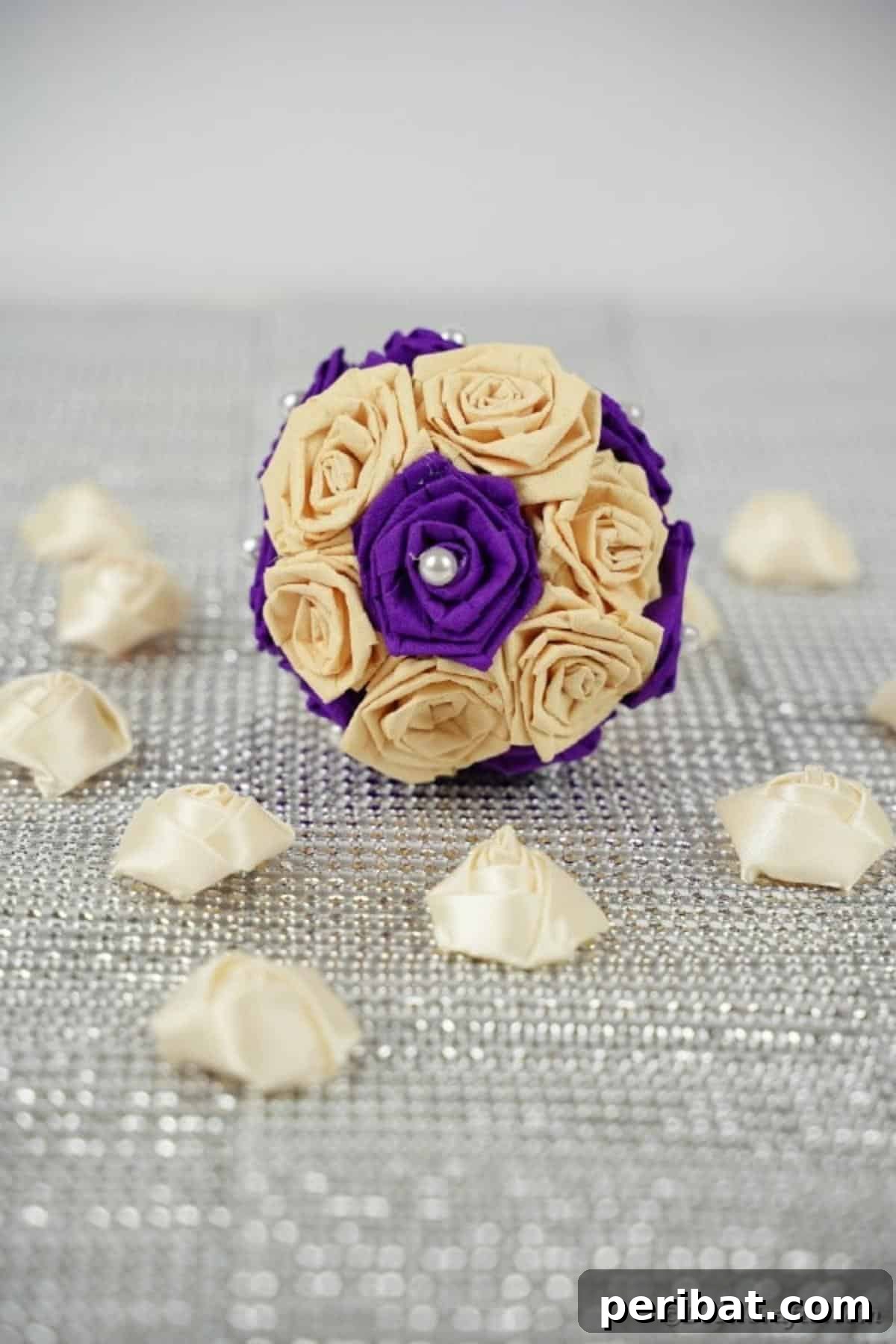Crafting Elegant Tissue Paper Roses Step by Step 3 Purple and cream rose ball on burlap