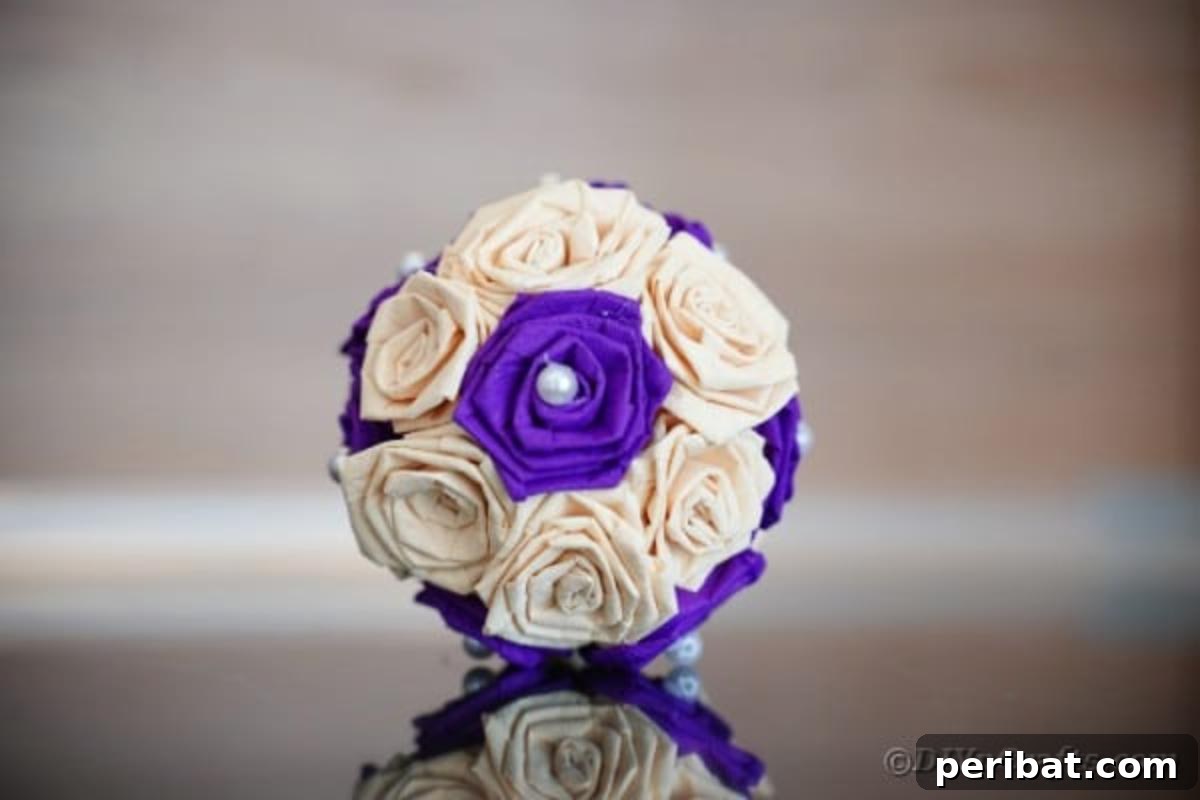 Crafting Elegant Tissue Paper Roses Step by Step 4 Purple and cream tissue paper ball on table