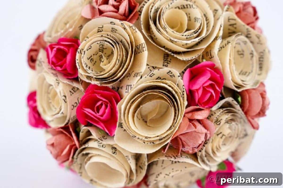 From Pages to Petals: DIY Book Rose Sphere 6 A detailed close-up of a single, perfectly rolled paper rose, demonstrating the simple yet elegant craft