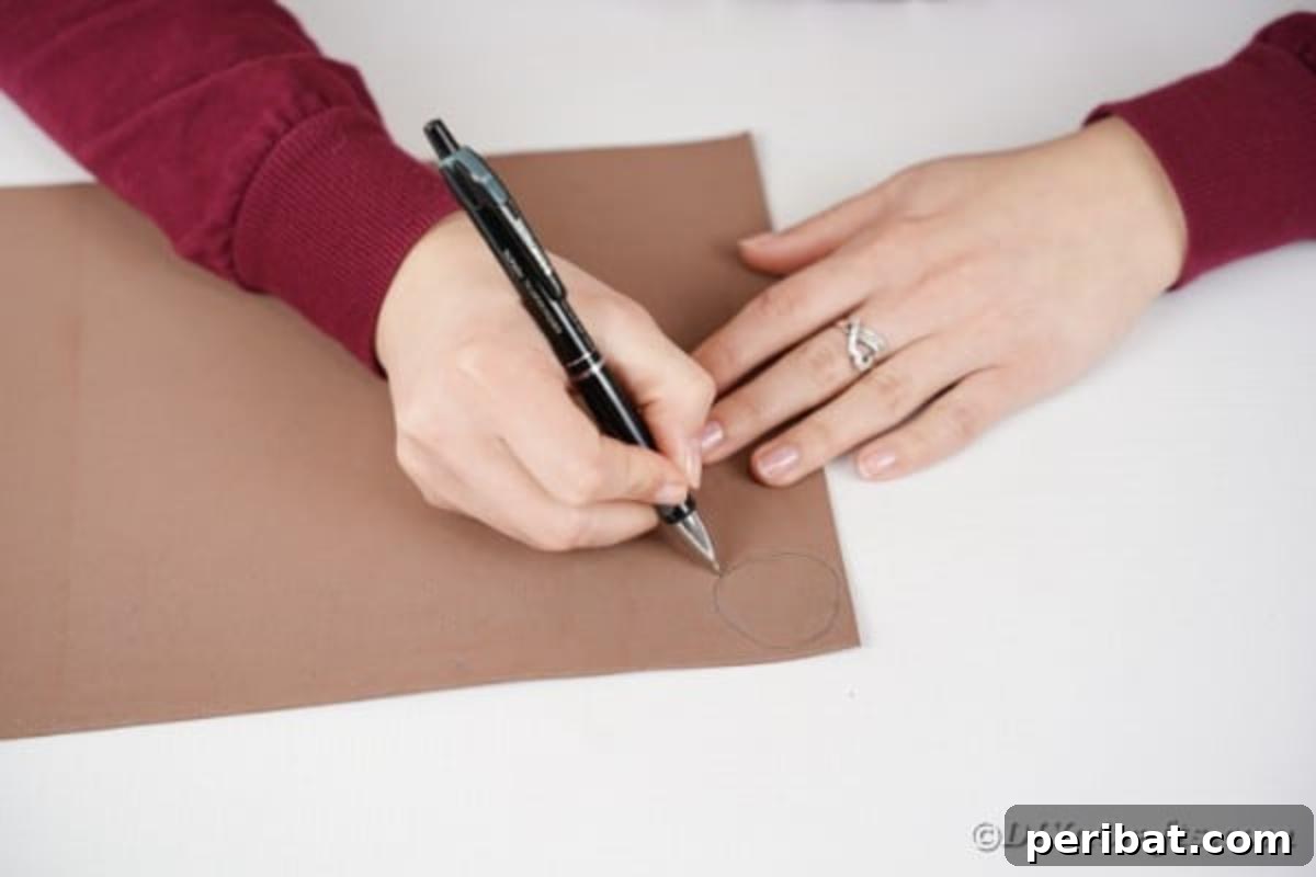 Drawing tail, ears, and paws on brown paper
