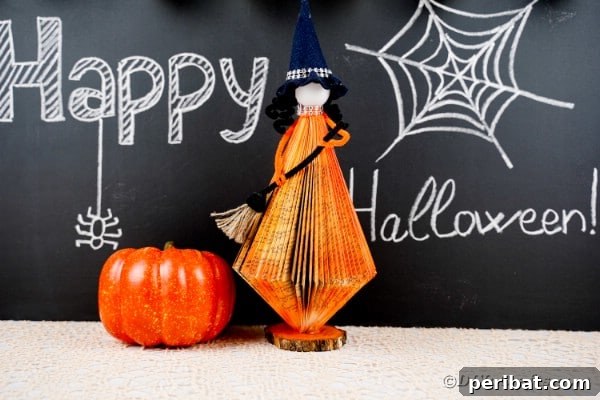 Upcycled Book Floating Witch Halloween Decor 2 Old book witch in front of chalkboard