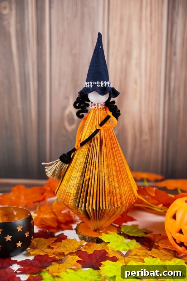 Upcycled Book Floating Witch Halloween Decor 41 Witch in front of wood paneling