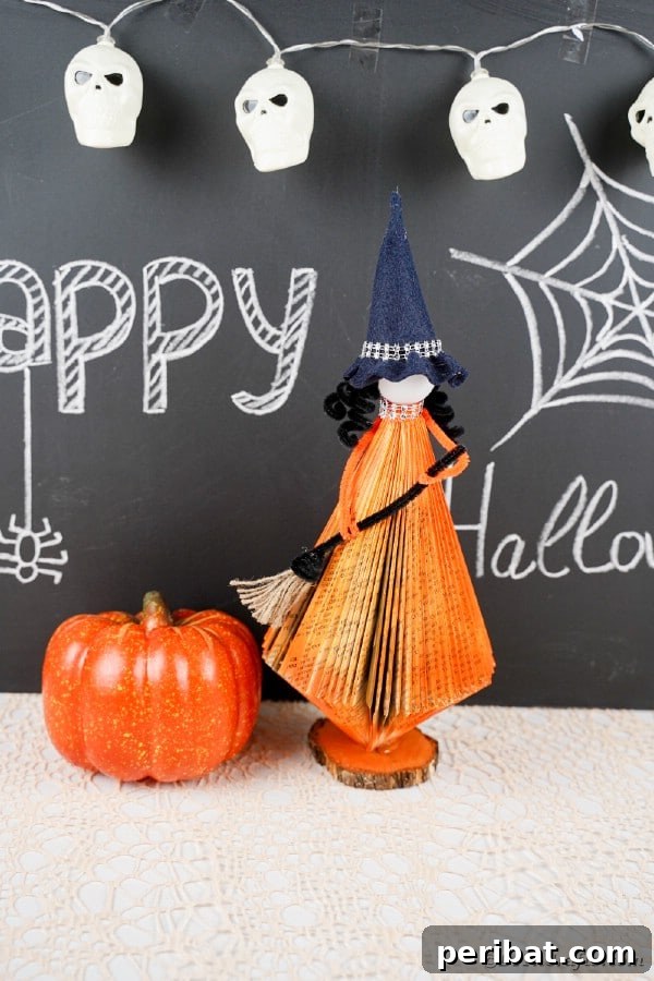 Upcycled Book Floating Witch Halloween Decor 45 Old book witch in front of chalkboard