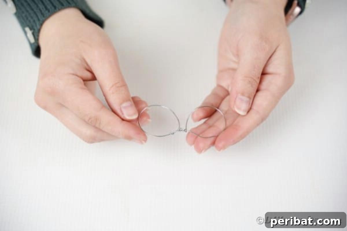 Making wire glasses for santa claus, illustrating the shaping of wire spectacles