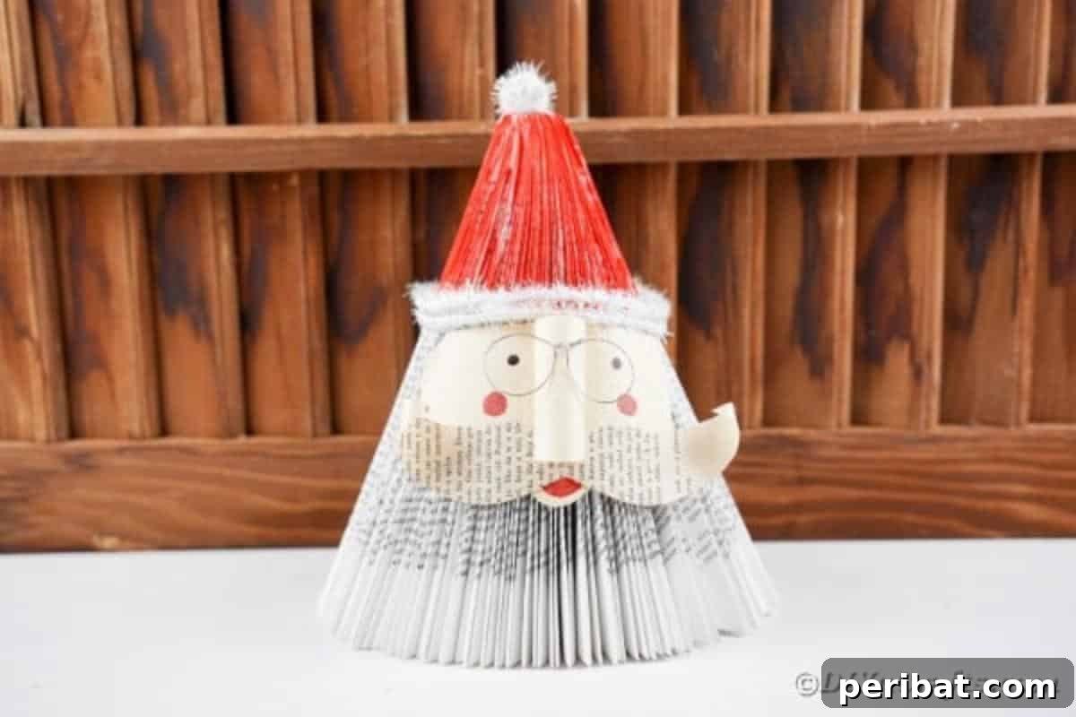 Book santa claus in front of wooden slats, proudly displayed