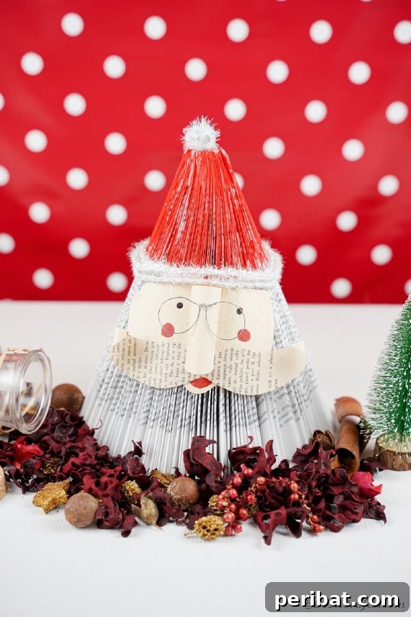 Book Santa Claus in front of red polka dot background
