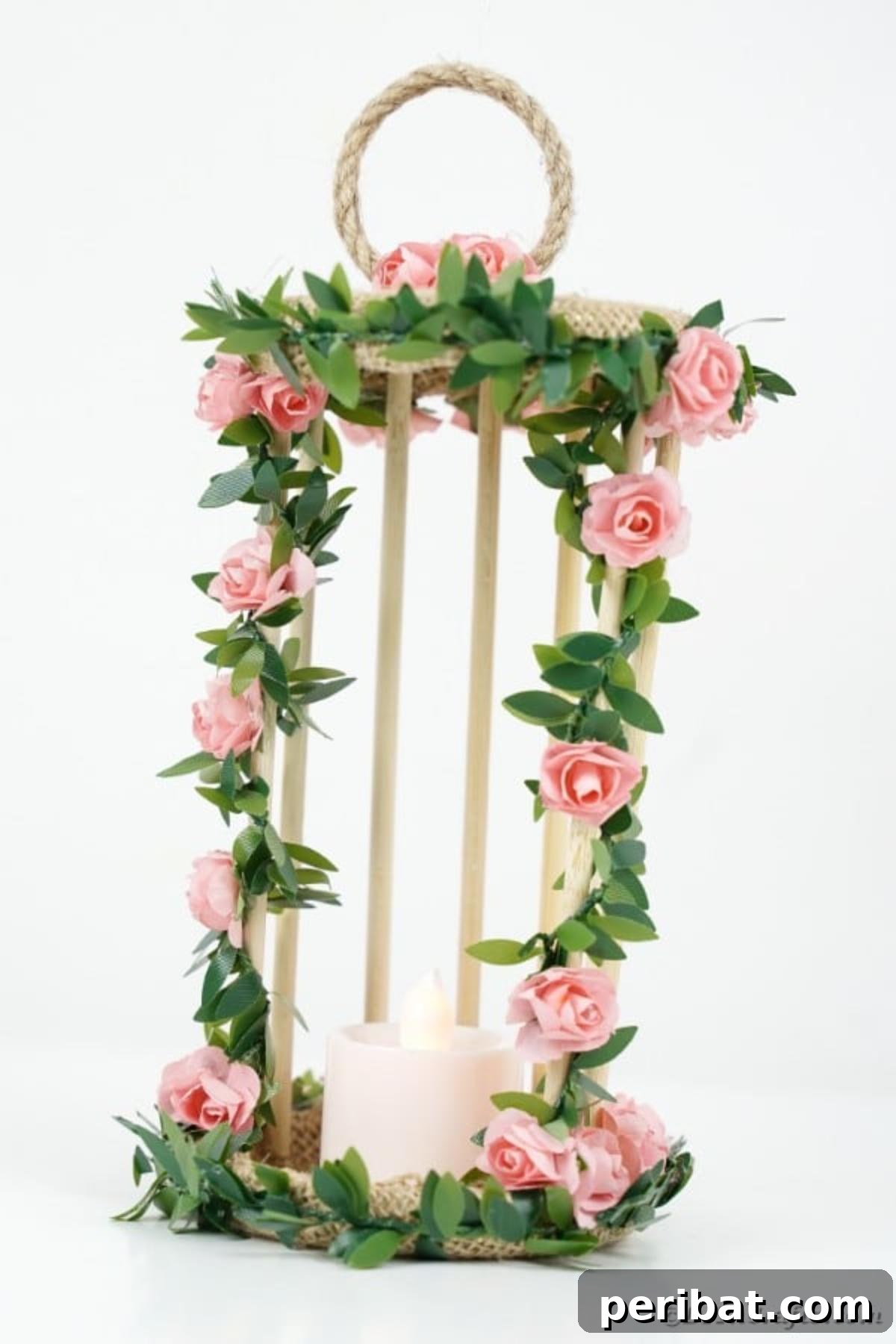 Enchanted Garden Birdcage Luminary 22 Birdcage candle holder placed on a clean white surface, emphasizing its delicate details.