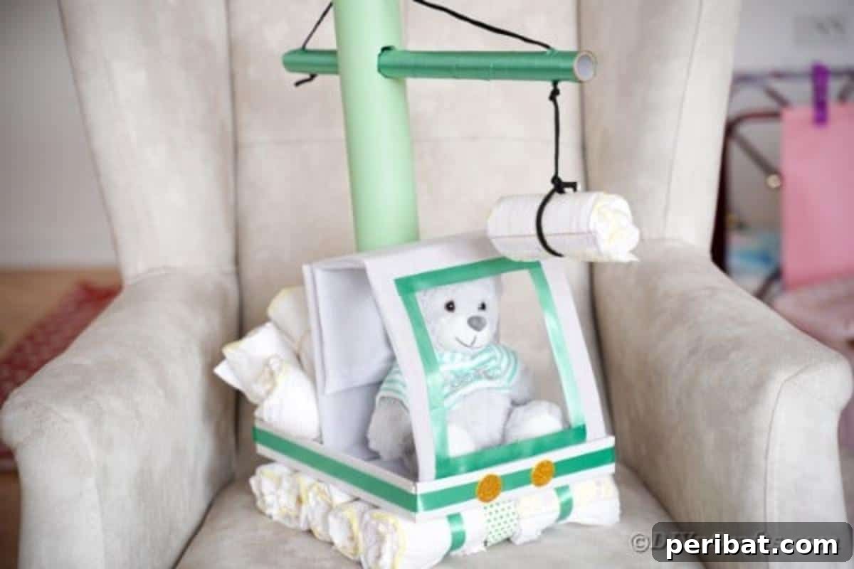 A charming crane diaper cake resting on a grey armchair, demonstrating its versatility as both a gift and decorative piece in a cozy setting.