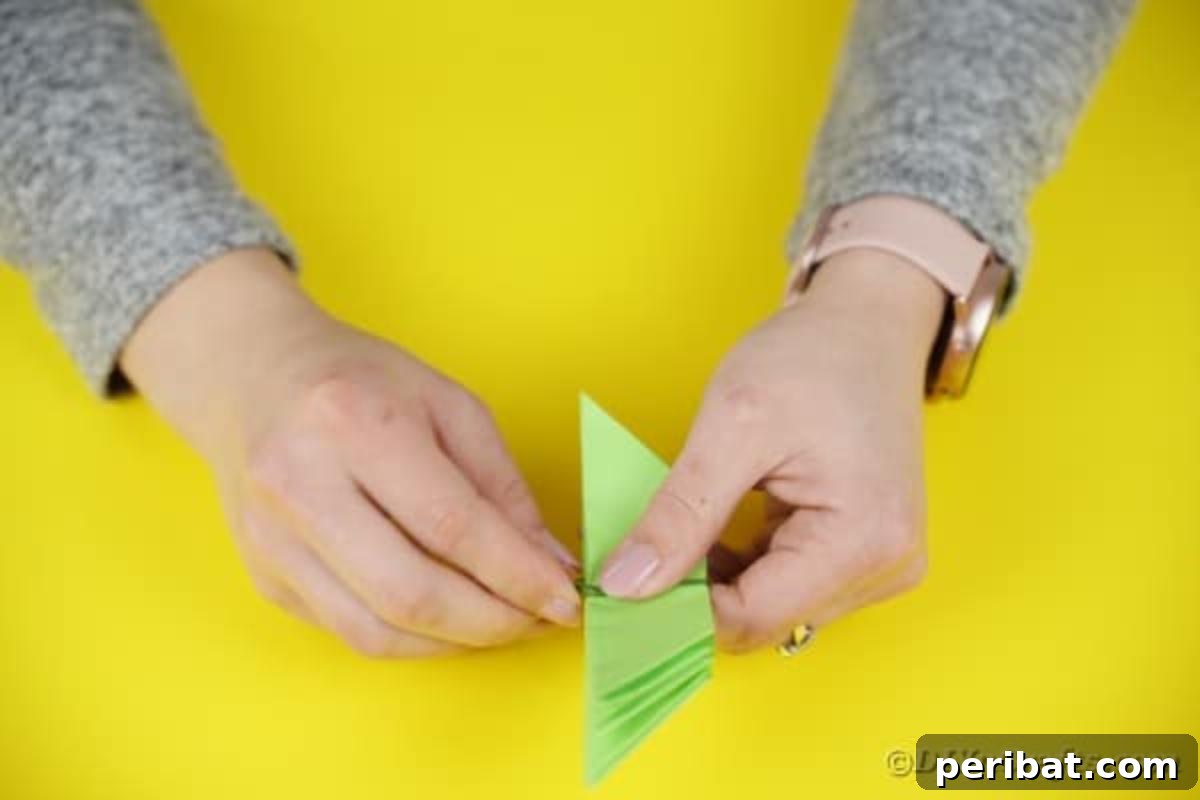 All green paper segments stacked and tied in the center.