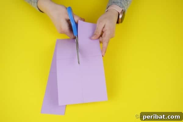 Cutting purple paper